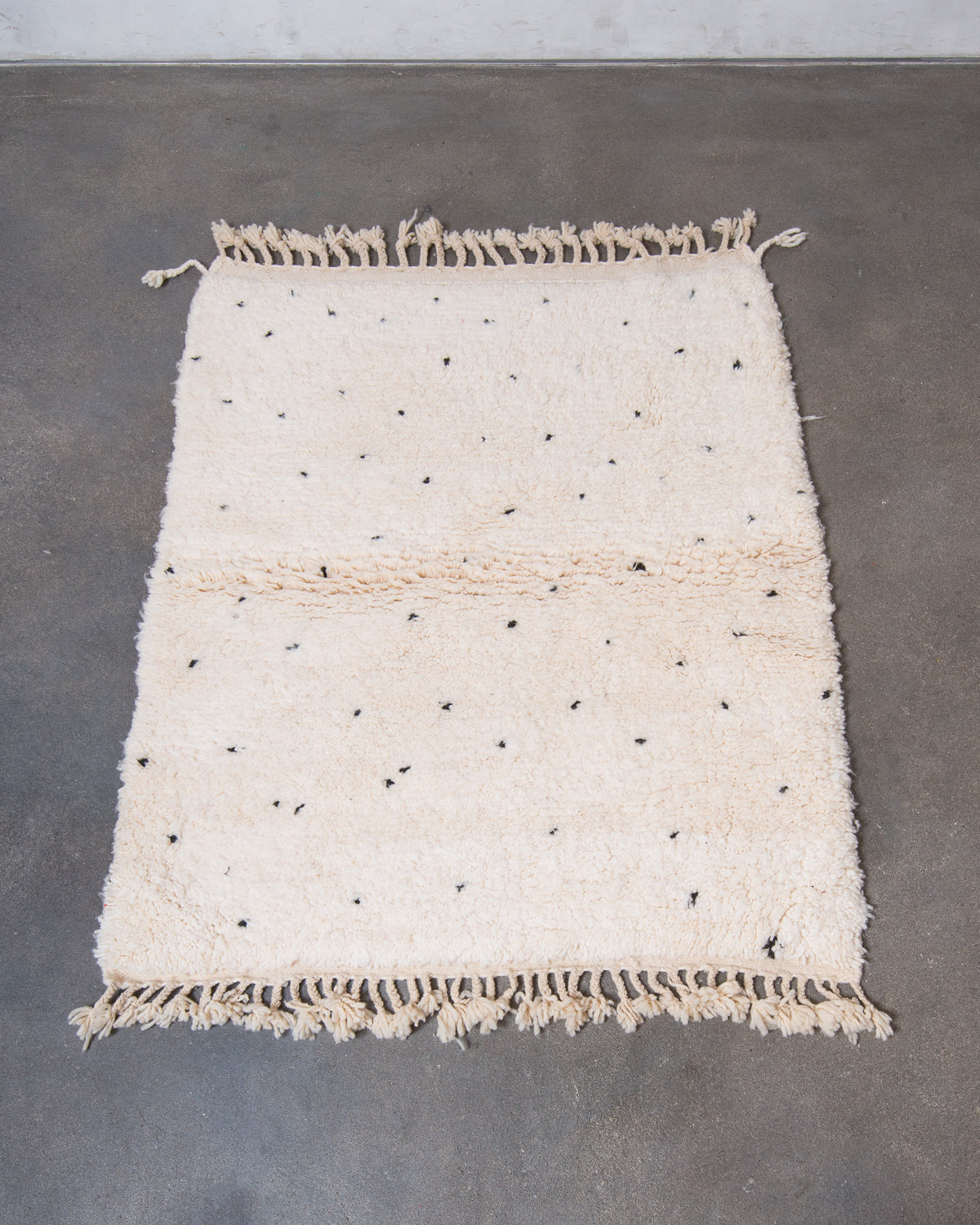 Modern, designer, handcrafted Berber rug from Morocco. Beniourain carpet with beautiful colours and patterns and fluffy wool texture.